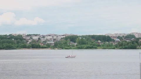 A motorboat sails down the river, slow motion video Stock Footage 328299484
