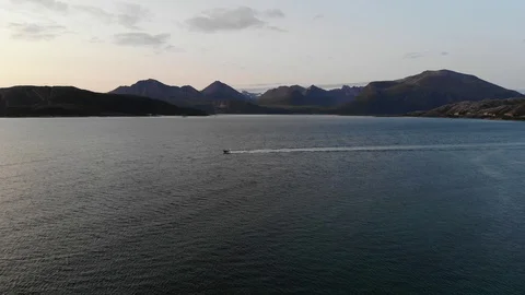 Motorboat in the sunset Stock Footage 129754408