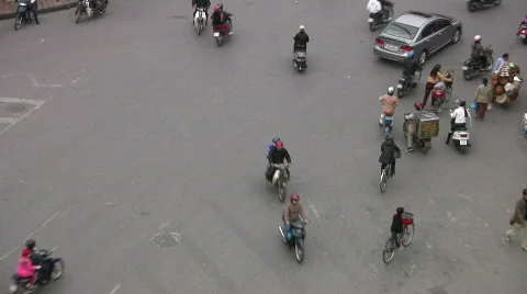 Motorcycle and cars traffic Asian city horns honk congestion Hanoi Vietnam Asia Stock Footage