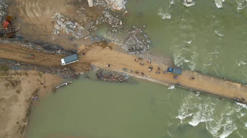 Motorcycle And Scooter Riders Navigate Around Truck Stuck In Mud Central Stock Footage 341440557