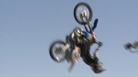 MOTORCYCLE BACK FLIP JUMP STUNT TRICK BIG AIR MOTOCROSS RIDER HD 1080 Stock Footage 25790215