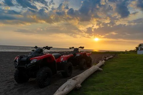 Motorcycle on the Beach in Front of the Ocean Stock Photos