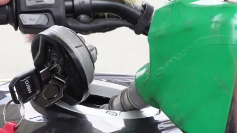 A motorcycle being refueled Stock Footage 314513302