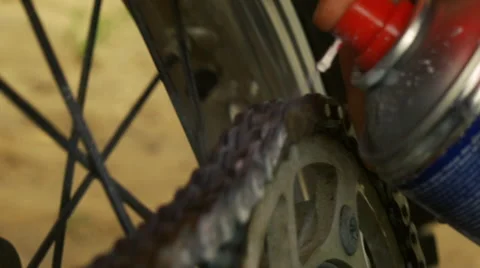 Motorcycle chain lubrication. Stock Footage 51642747
