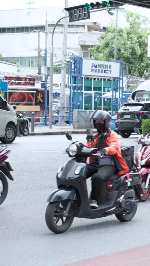 Motorcycle Commuters Navigating Busy Urban Street Intersection Stockbeeldmateriaal 340183227