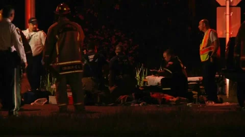 Motorcycle Crash CPR In Progress #1 Stock Footage 937821