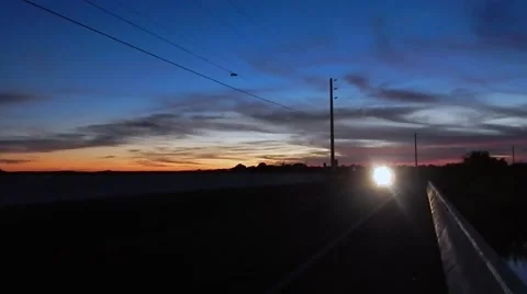 Motorcycle crossing bridge at sunset Stock-Footage 45290570