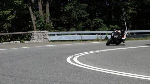 Motorcycle in a curve Stock Footage 32717192
