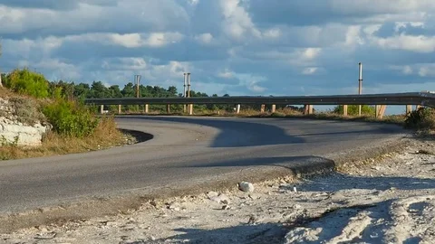 Motorcycle on curved road Stock Footage 69254645