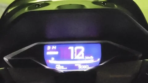 Motorcycle digital speedometer dashboard display at night Stockbeeldmateriaal 347659662
