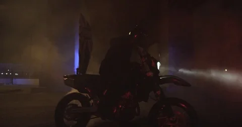 Motorcycle Doing Donuts at Night 2 Stock Footage 71789336
