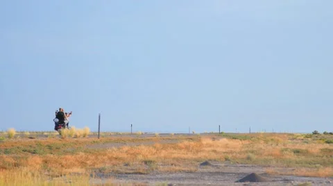 Motorcycle down lonely road Vídeos de archivo 53284840