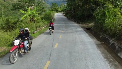 Motorcycle down the road 4k Stock Footage 222268784