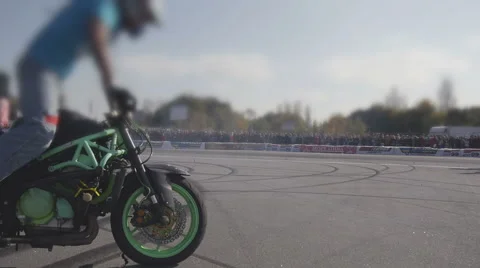 Motorcycle Driver Drifting on a New Highway in Odessa in Summer 스톡 동영상 64141544
