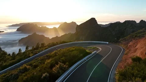 Motorcycle Driver Riding in High Mountain Landscape. Stock Footage 308090559