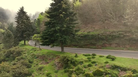 Motorcycle Driver Riding in High Mountain Landscape. Stock Footage 308090588
