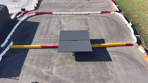 Motorcycle driving on asphalt training track aerial view Video stock 339304434
