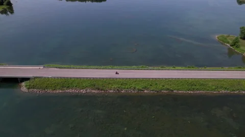Motorcycle driving on beautiful north eastern ontario highway Stock Footage 168772566