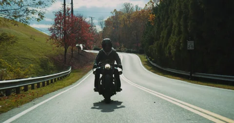 Motorcycle Driving In The Fall Slow Motion 4K Stock Footage 170270201