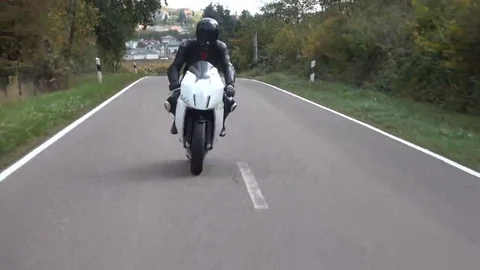 Motorcycle driving in the forest Stock-Footage 69233018