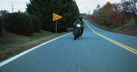 Motorcycle Driving Wide Slow Motion Front 4K Stock Footage 170295792