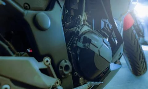 Motorcycle engine and mechanical components on modern road bike. Engineerin.. Stock Photos