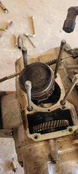 Motorcycle engine being repaired and disassembled Stock Photos