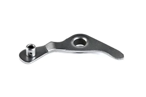 Motorcycle engine gear shift selector stopper lever arm isolated on white b.. Stock Photos