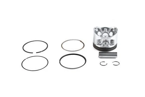 Motorcycle engine piston assembly rebuild kit with rings and pin on white t.. Stock Photos