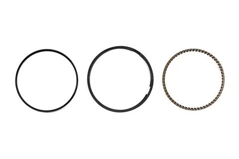 Motorcycle engine piston ring set with compression ring and oil expander ring Stock Photos