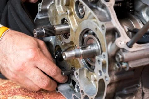 Motorcycle engine was separated into small parts for fix after it broken Stock Photos