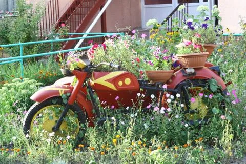 Motorcycle with flowers Stock Photos