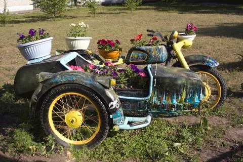 Motorcycle with flowers Stock Photos