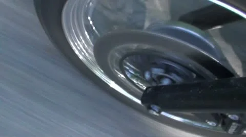 Motorcycle front tyre going fast shadows - HD 1920 PAL Stock Footage 10877949