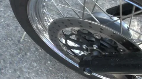 Motorcycle front tyre start stop - Multimedia 640x360 Stock Footage 10878071