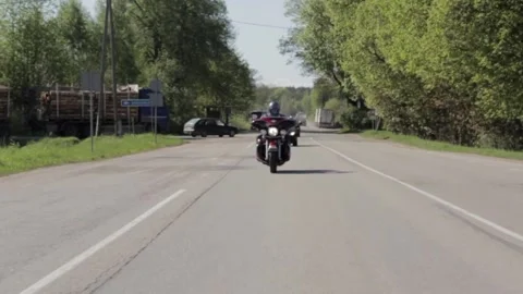Motorcycle from the front while driving on the road Stock Footage 247901096