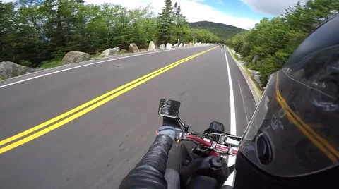 Motorcycle gets passed by another rider pov Stock Footage 56565571