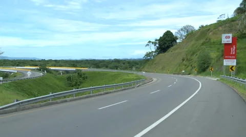 Motorcycle is going to cross the bridge road Stock Footage 61281280