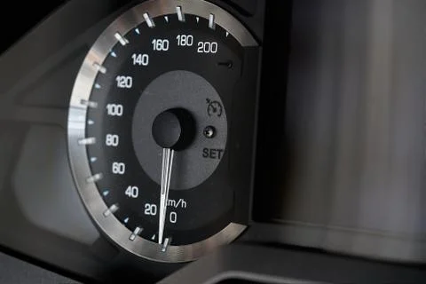 Motorcycle handlebar controls including speedometer Stock Photos