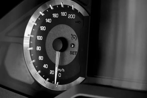 Motorcycle handlebar controls including speedometer Stock-Fotos
