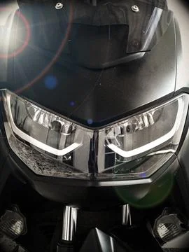 Motorcycle headlight. Stock Photos