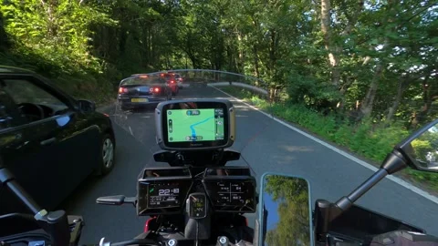 Motorcycle Jumping the queue UK Stock Footage 204868800