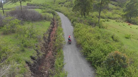 Motorcycle in the jungle 스톡 동영상 112073735