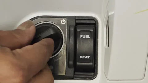 Motorcycle keyless ignition switch operation with smart key knob 库存影片 347659826