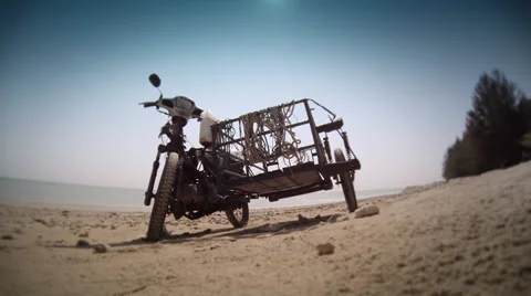Motorcycle on a Khao Lak beach Stock Footage 39655224