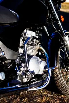 Motorcycle. the main part of the engine. there is dirt on it. close-up. there Stock Photos