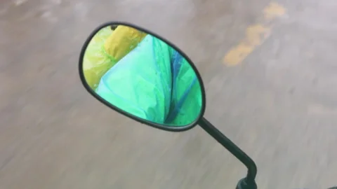 Motorcycle mirror on background of road. Video stock 305532441