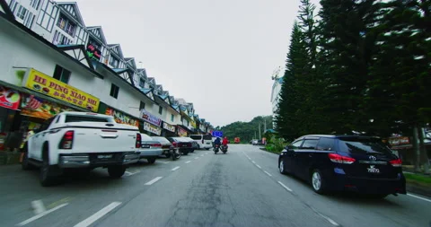 Motorcycle Mount Through Route 59 at The Cameron Highlands in Northern Malaysia Stock Footage 146571138