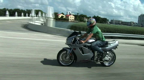 Motorcycle next to Intercoastal Stock Footage 756773