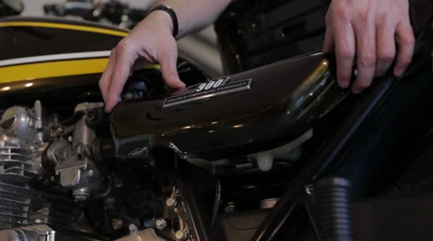 Motorcycle Oil Cover Stock Footage 34334500